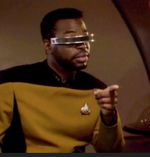 Geordi La Forge pointing in approval (lower half of the Geordi variant of the Drakeposting meme format)