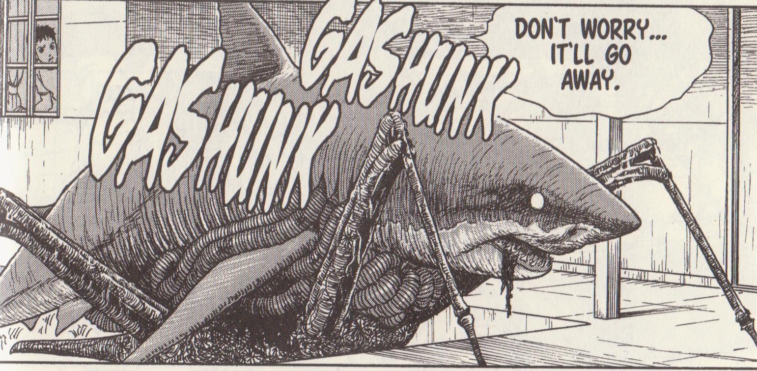 A shark on mechanical legs from Junji Ito's 'Gyo' manga with a speech bubble reading 'Don't worry, it'll go away'